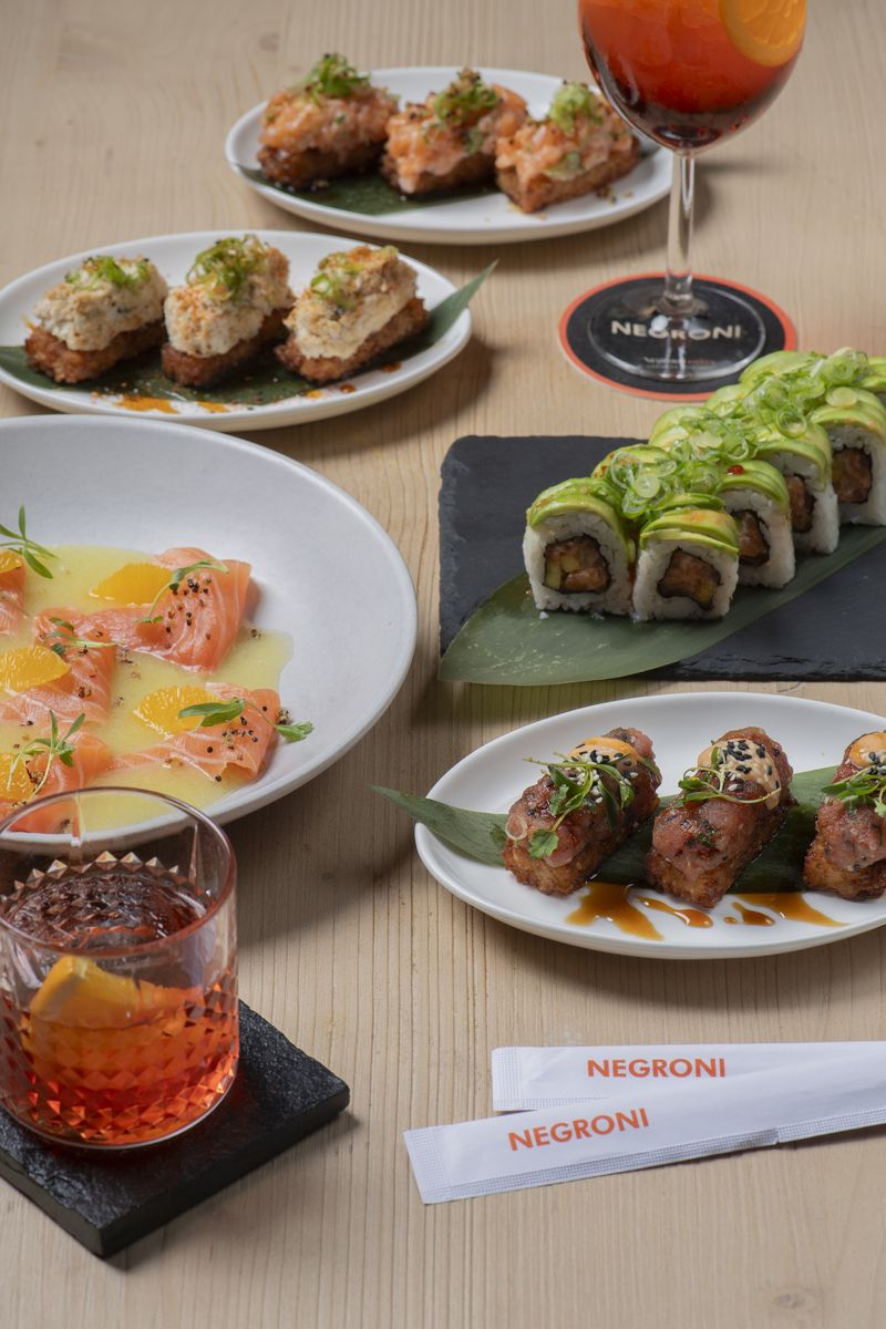 Sushi rolls and crispy rice spread
